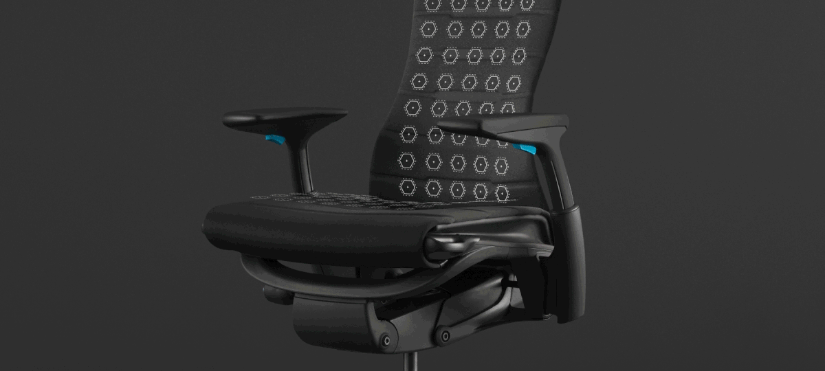 A red and blue animation of the enhanced seat on a photo of the Embody Gaming Chair on a black background.
