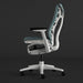 Side view of a blue-green and white Herman Miller X Logitech Embody gaming chair in Galaxy